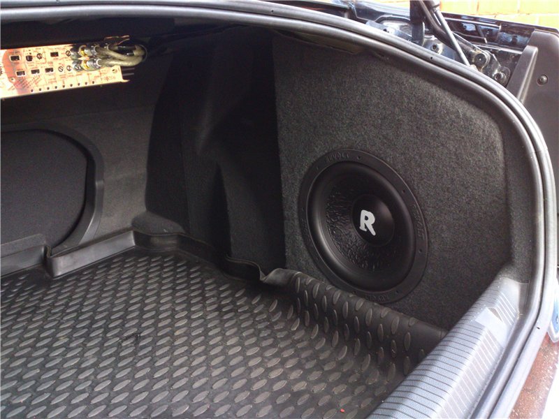Opel compact active under-seat subwoofer installation in Dublin