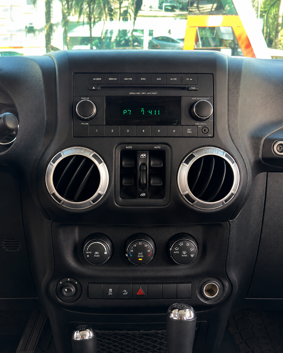Old factory radio before Apple CarPlay installation