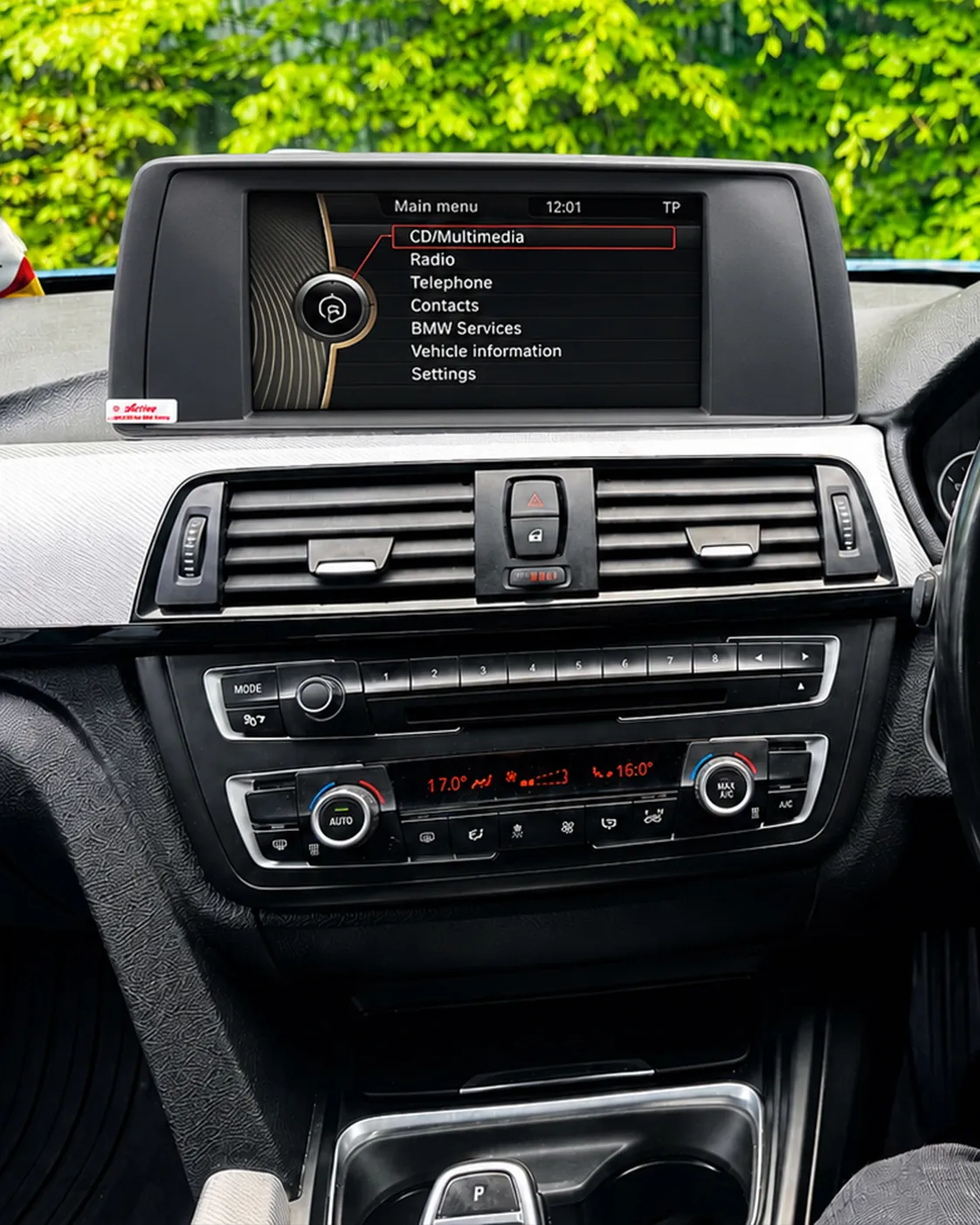 Old factory radio before Apple CarPlay installation